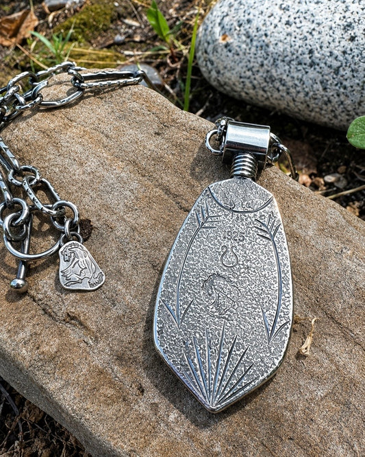 Kingman Turquoise Tufa Cast Feather Pendant