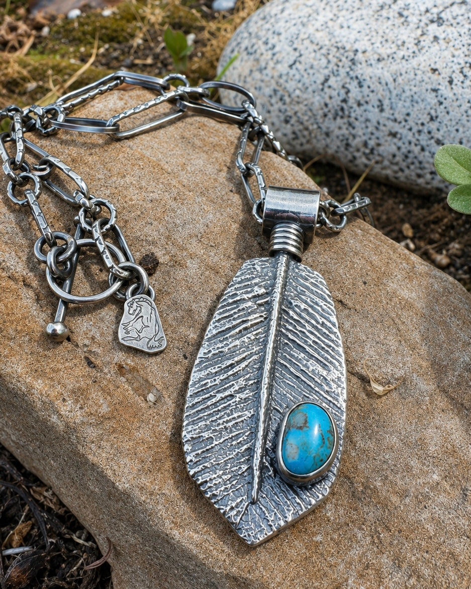 Kingman Turquoise Tufa Cast Feather Pendant